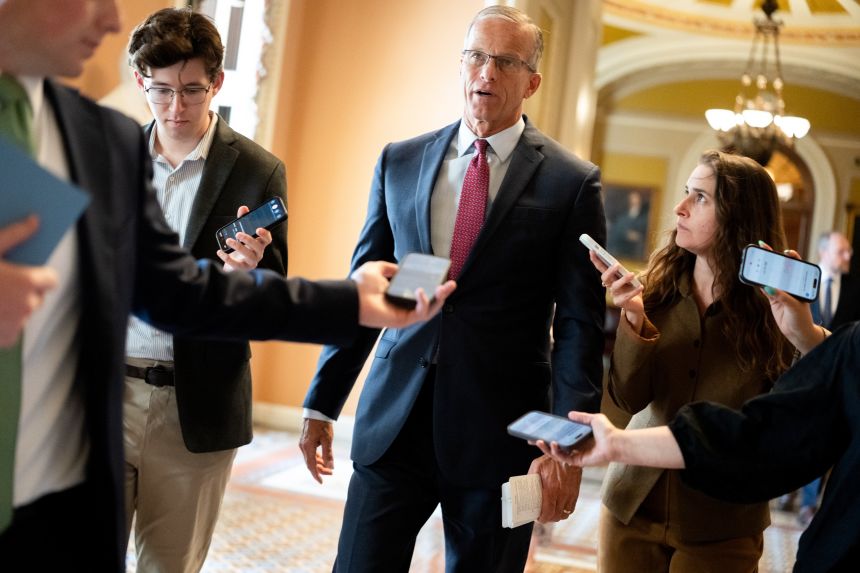Senate Majority Leader John Thune, a Republican from South Dakota, speaks to members of the media at the US Capitol in Washington, DC, on July 22, 2026. Senate Majority Leader John Thune is planning a vote on crypto market structure legislation as soon as next week despite Democratic criticism that the bill would do little to curb President Donald Trump's rapidly accumulating crypto wealth.